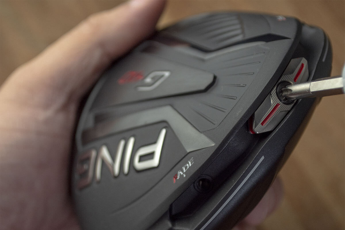 A Ping driver, one of the best 2020 drivers golf, in someone's hand