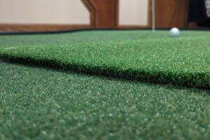 7 Golf Drills You Can Do Inside With Just A Mat And Net