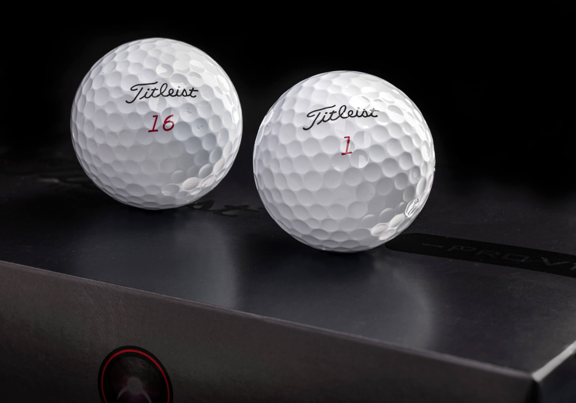 A 2026 Pro V1x Left Dash next to a #16 prototype