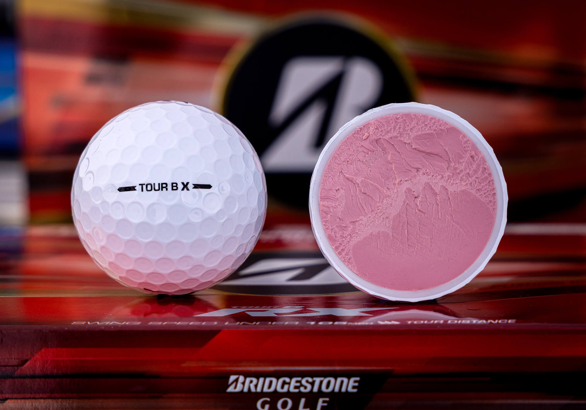 Bridgestone TOUR B RX golf ball with visible core.