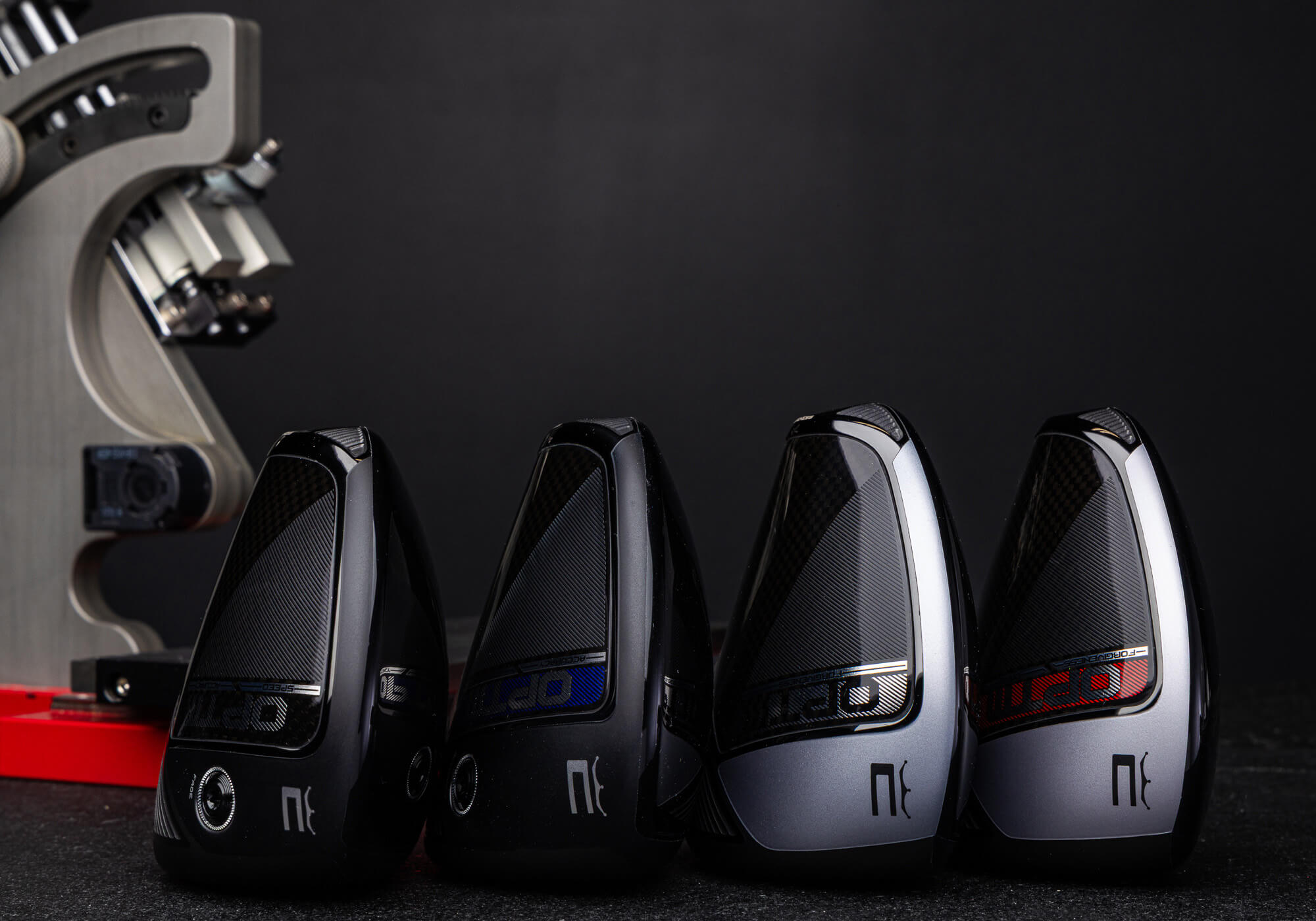 The 4 models in the COBRA OPTM Driver family on their sides