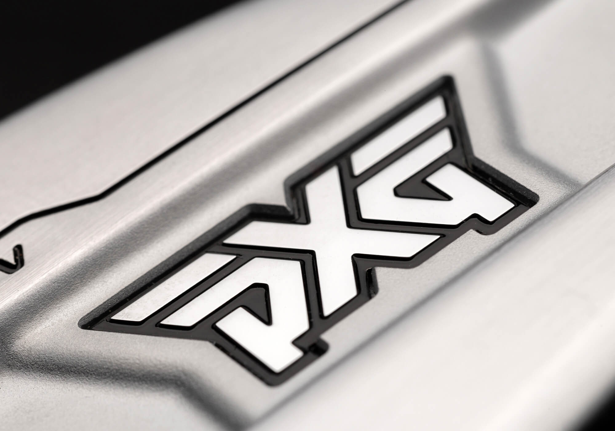 A closeup of the PXG logo on 0311 GEN8 irons
