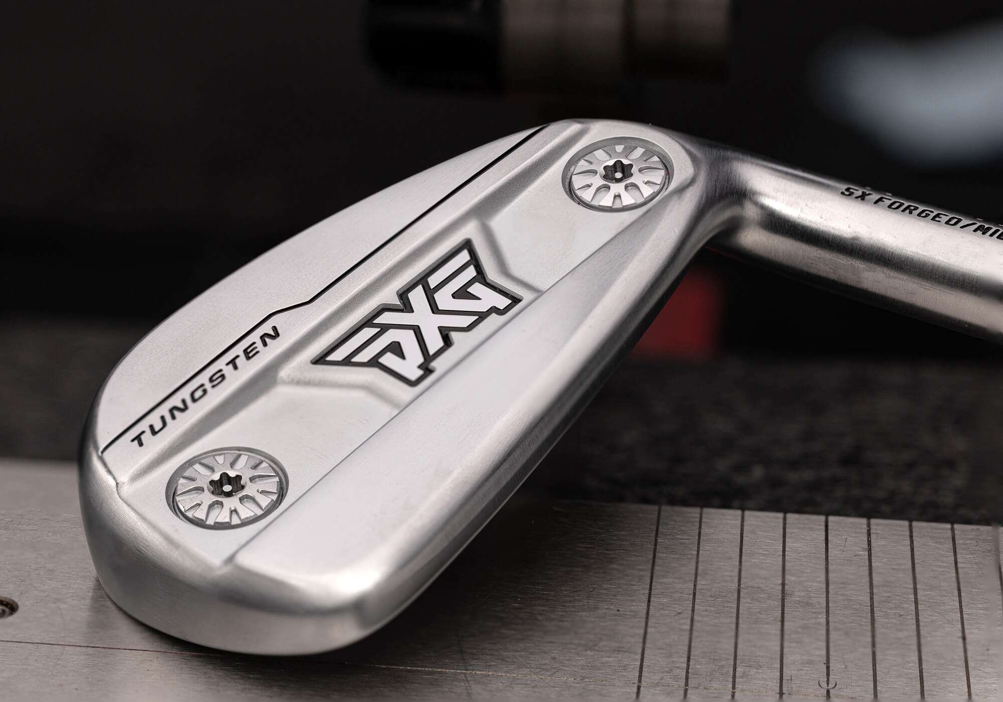 A PXG 0311 GEN8 iron shot to emphasize the movable weights