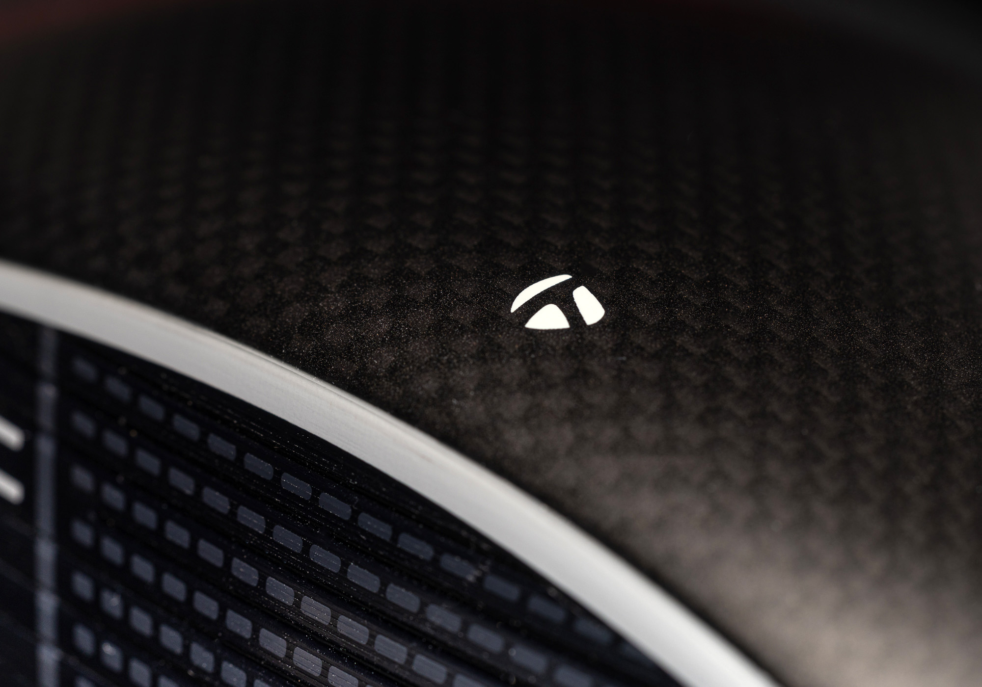 A closeup of a TaylorMade Qi4D Driver crown and face