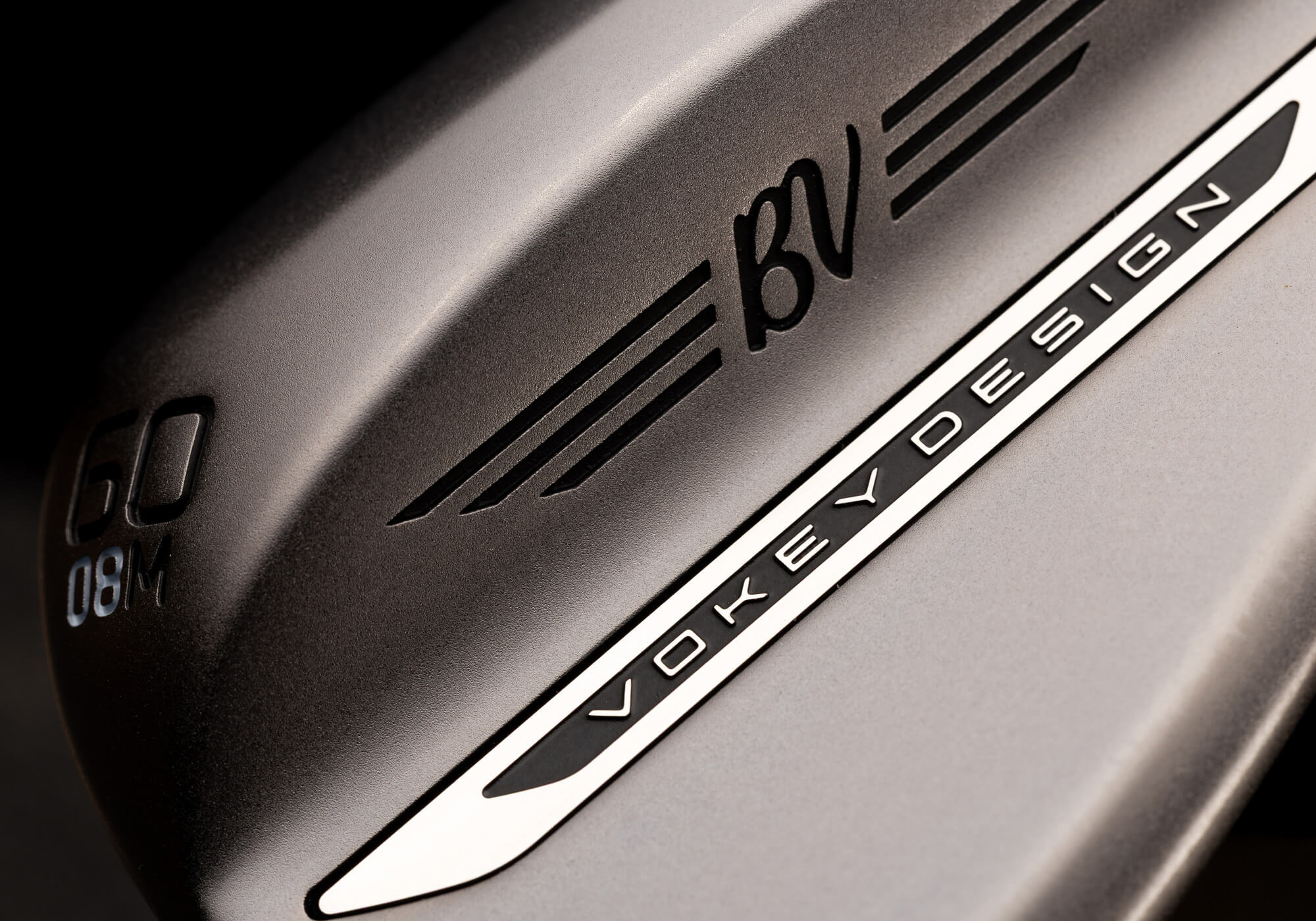 A closeup of a Vokey SM11 wedge