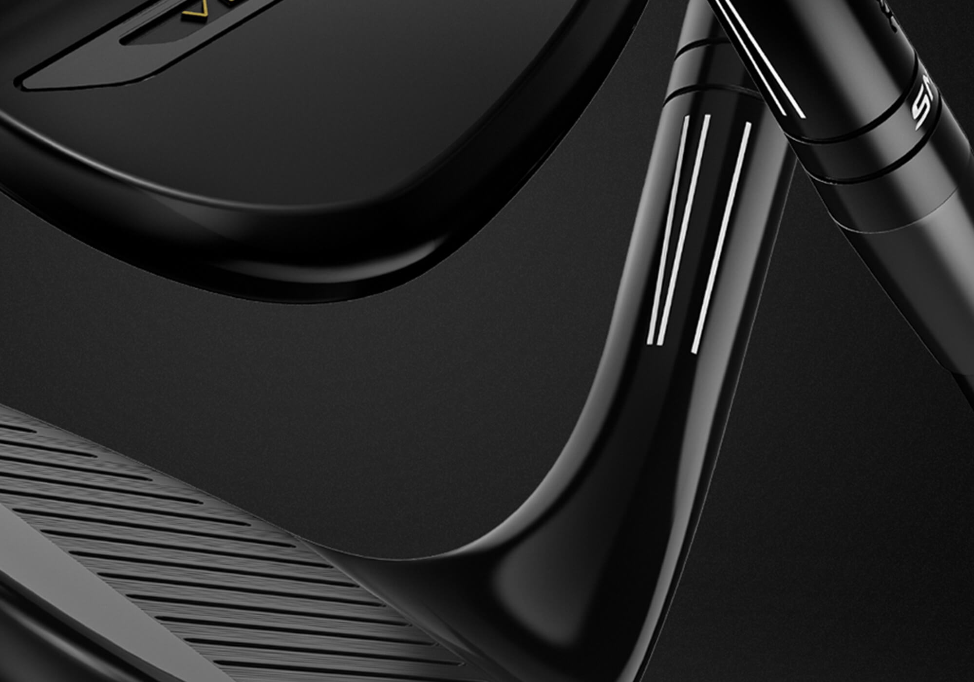 A close up of Flight Lines on the Titleist SM11 wedges in Black Vapor.